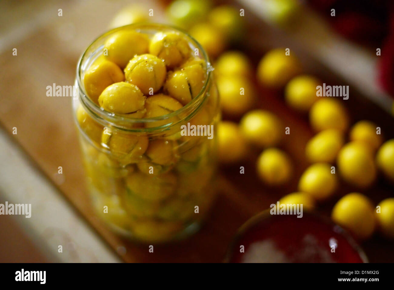 Home made olive curing. Cut olives are placed in a jar with brine Stock