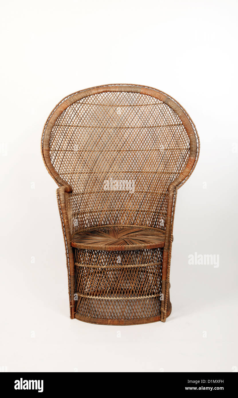 Large wicker or rattan high backed chair Stock Photo Alamy