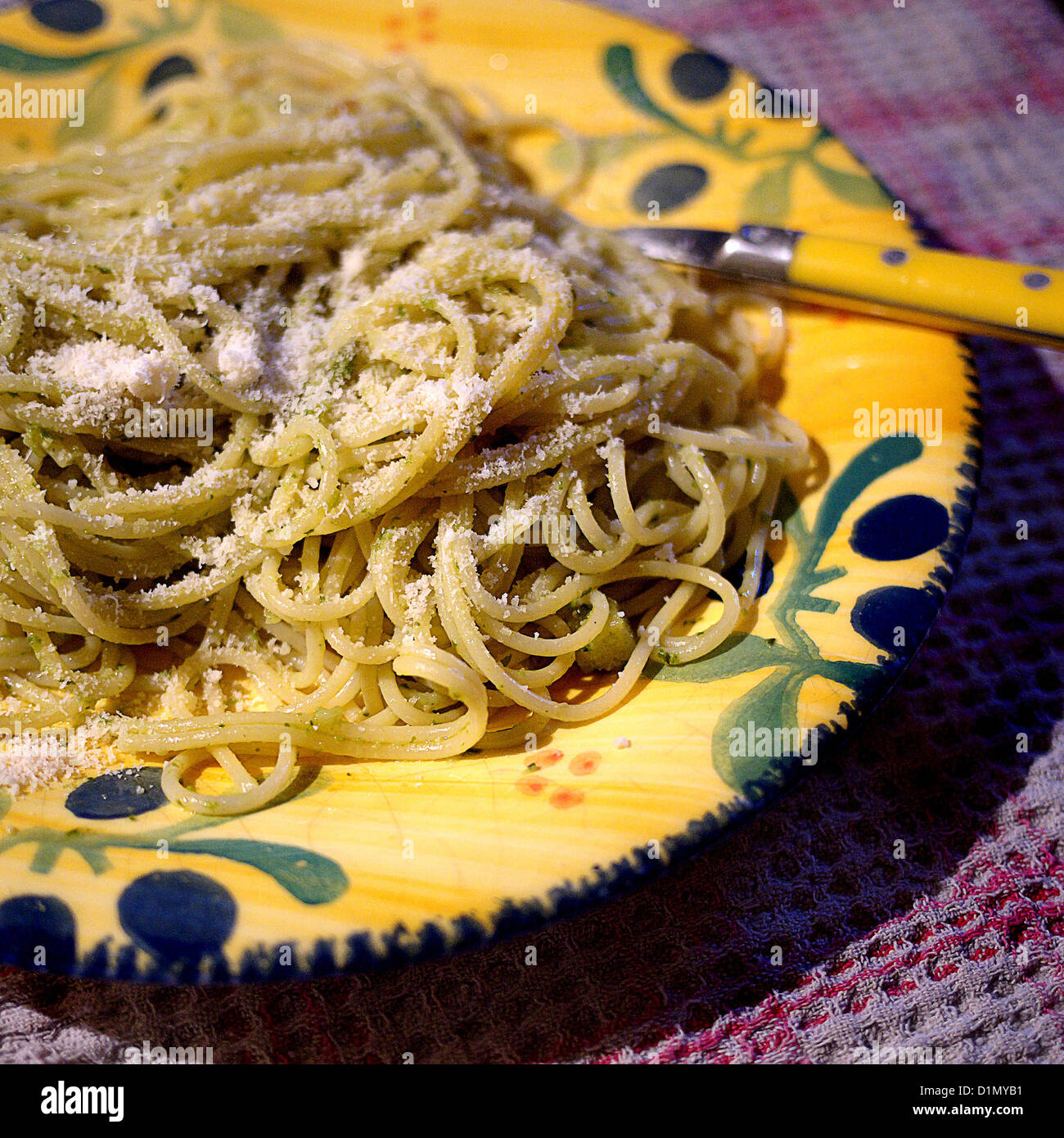 spaghetti on a yellow plate Stock Photo Alamy