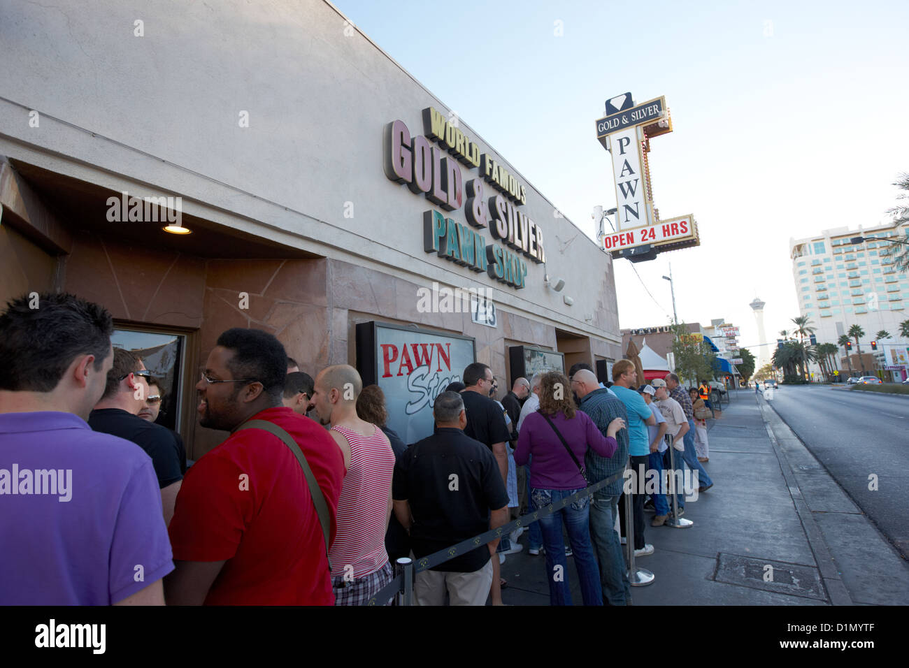 people fans waiting in line outside famous gold and silver pawn shop downtown Las Vegas home to the tv series pawn stars Nevada Stock Photo