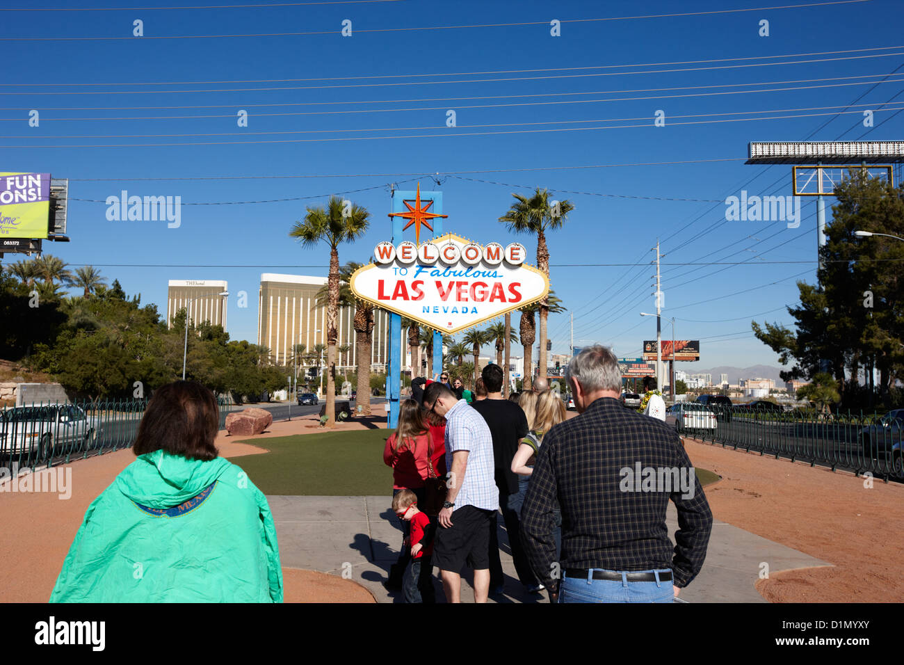 visitors waiting in line to take photos at the welcome to fabulous Las Vegas sign Nevada USA Stock Photo