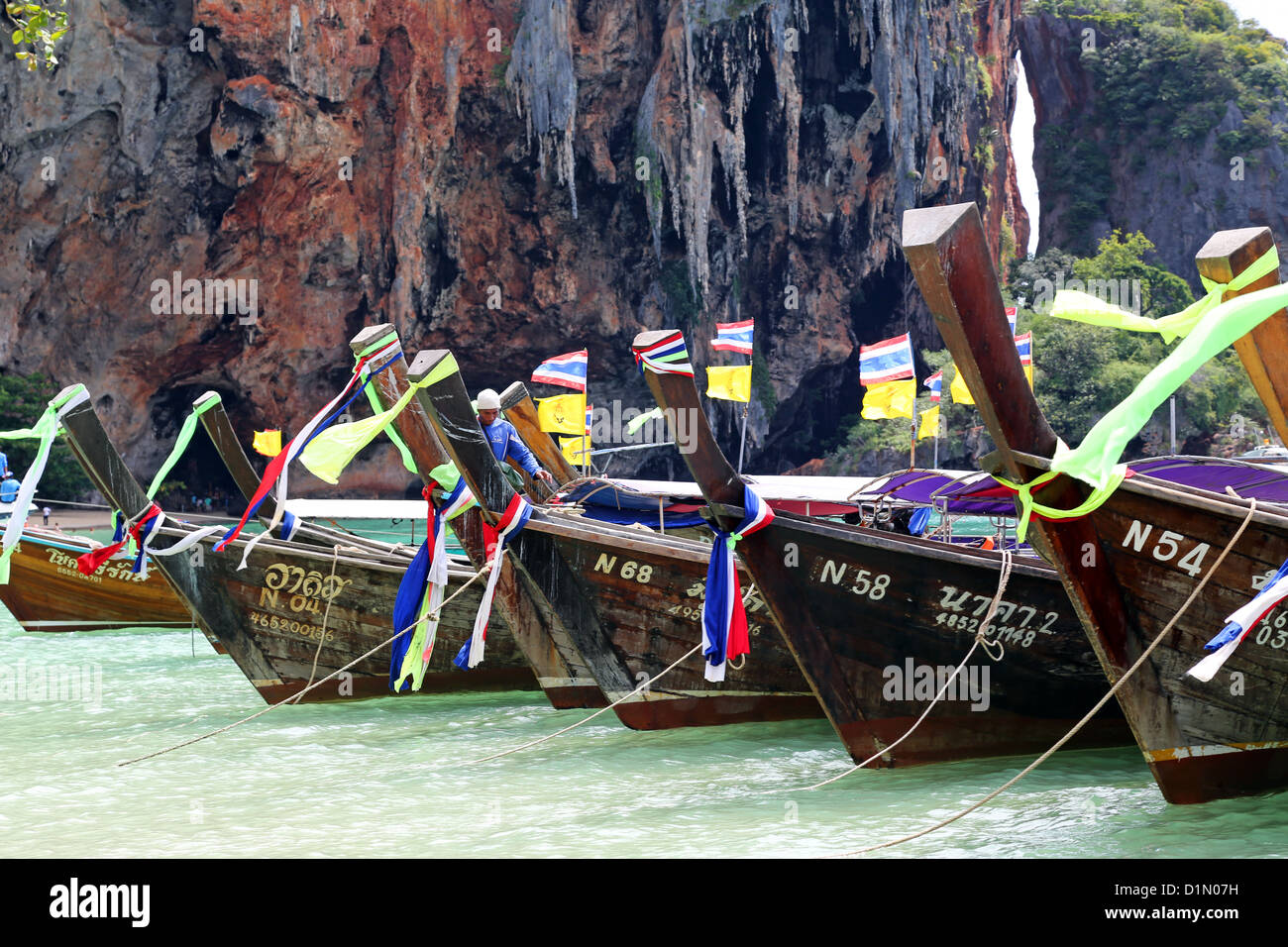Traditional Thai long tail boats at Phranang Cave Beach, Railay Beach, Krabi, Phuket, Thailand Stock Photo