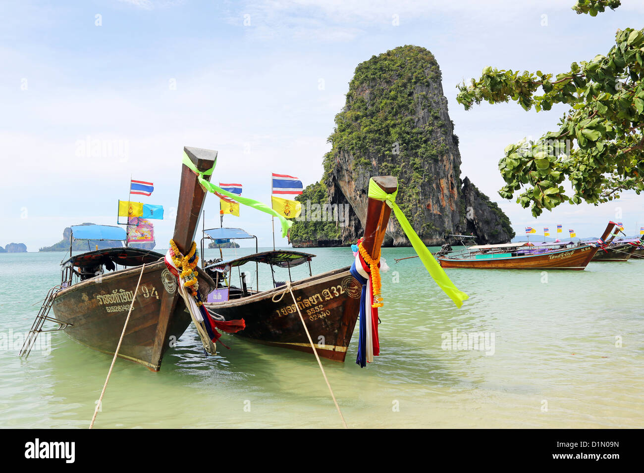 Traditional Thai long tail boats at Phranang Cave Beach, Railay Beach, Krabi, Phuket, Thailand Stock Photo