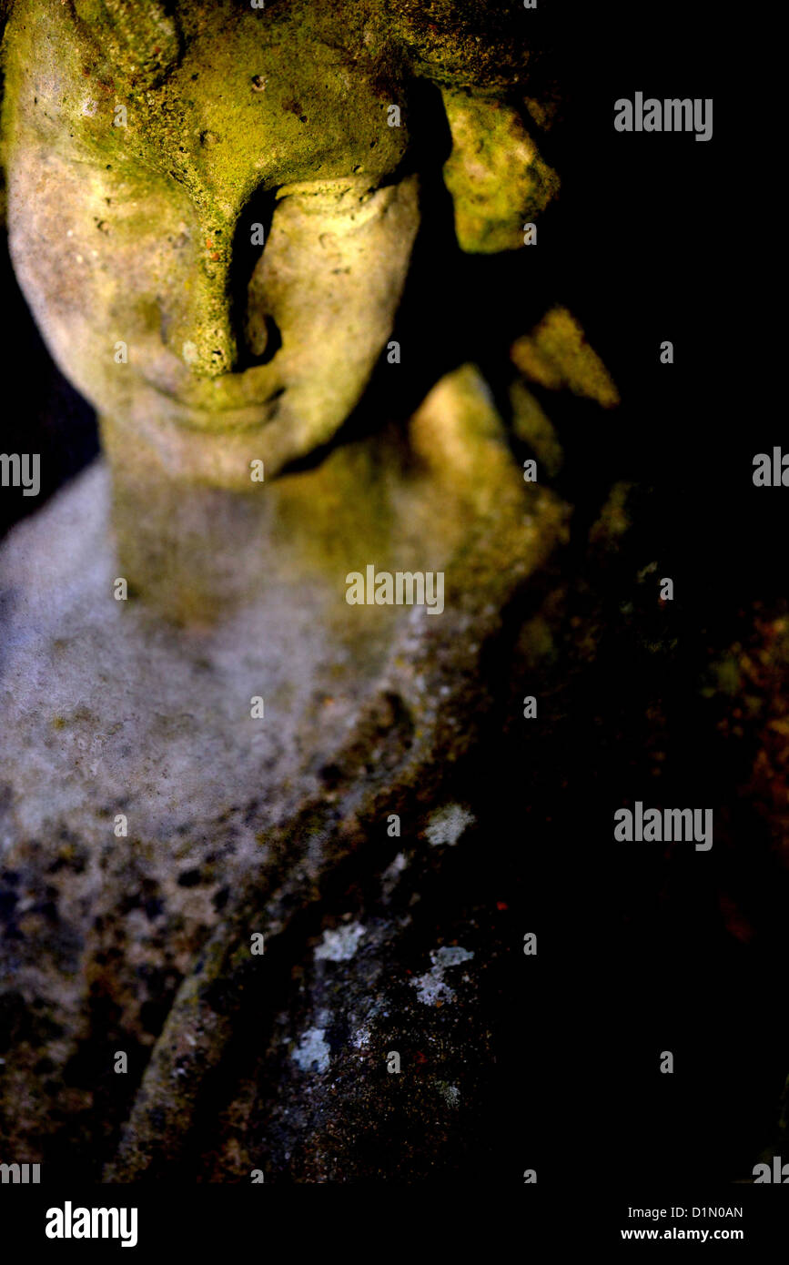 Garden Statue of a Young Woman Stock Photo - Alamy