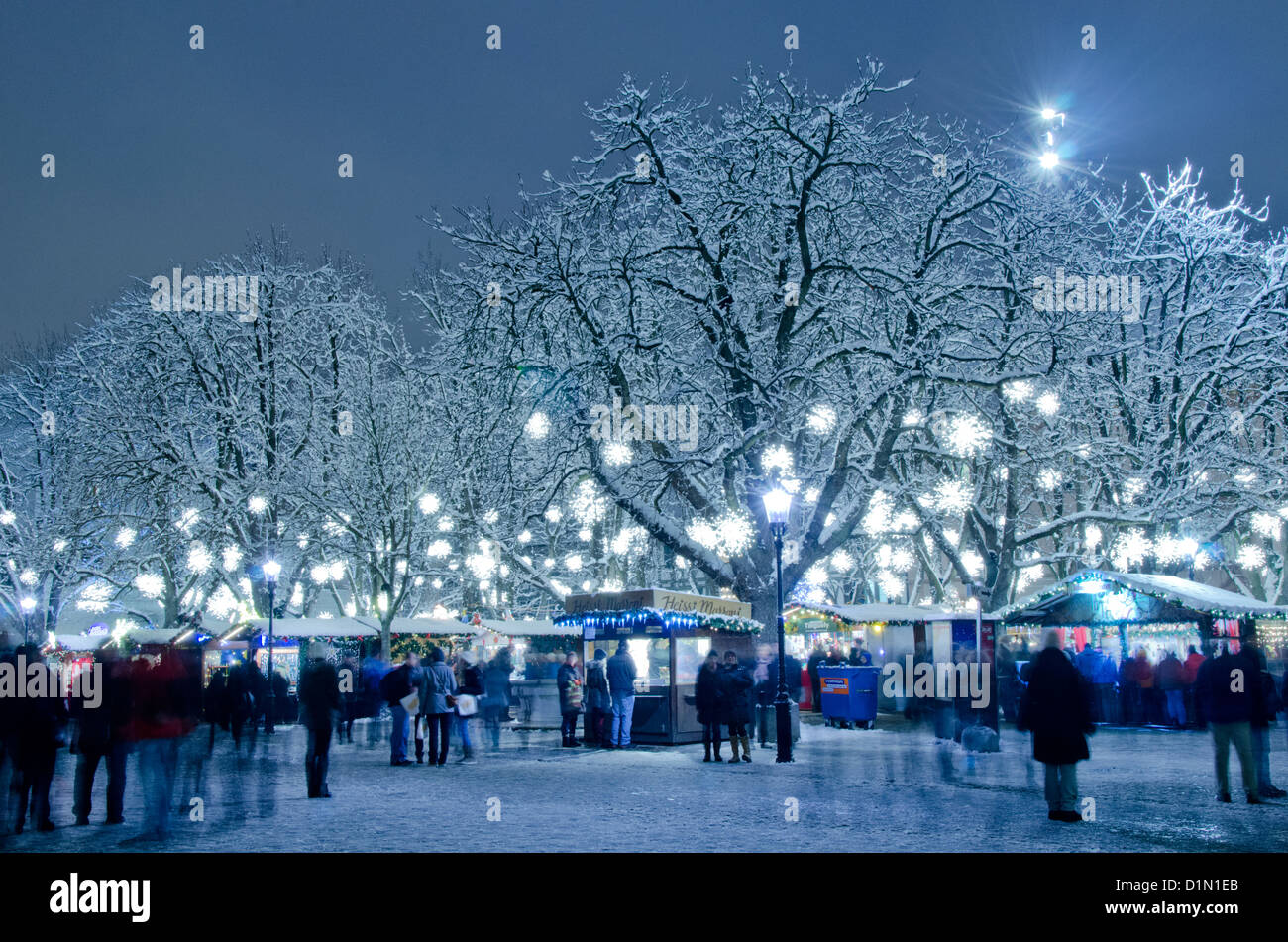 Switzerland, Basel. Munsterplatz Winter Holiday Market (aka Le Marche de Noel du Munsterplatz). Stock Photo