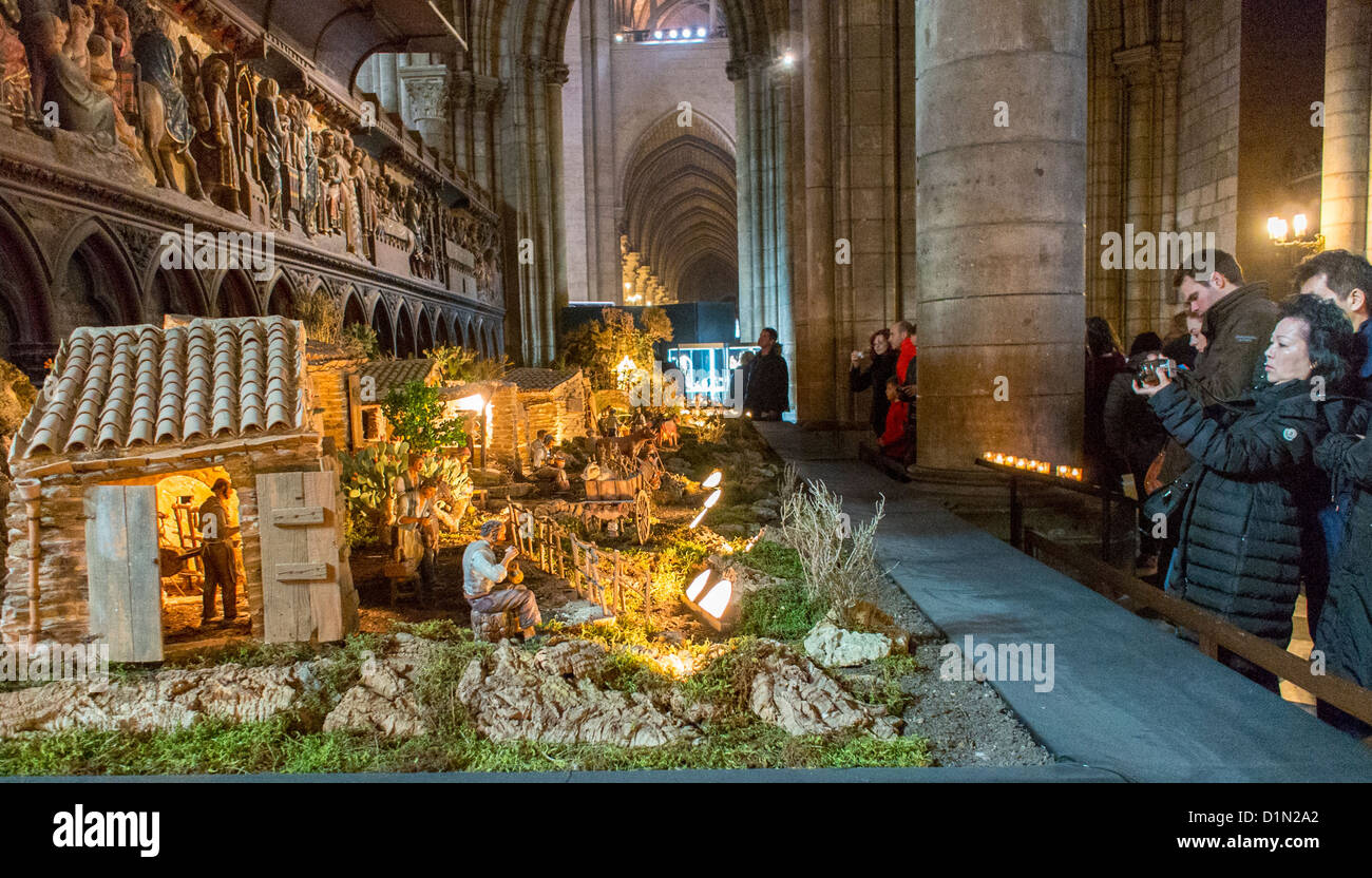Paris, France, Inside French Catholic Church, Notre Dame Cathedral, Christmas Crib, Creche, middle ages religion, French catholics, european religious practice Stock Photo