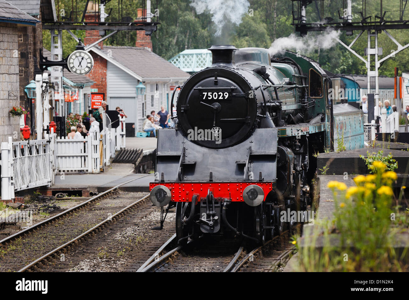 Steam engine 75029 (The Green Knight) leaving Grosmont Station, North Yorkshire Moors Railway, North Yorkshire, England Stock Photo