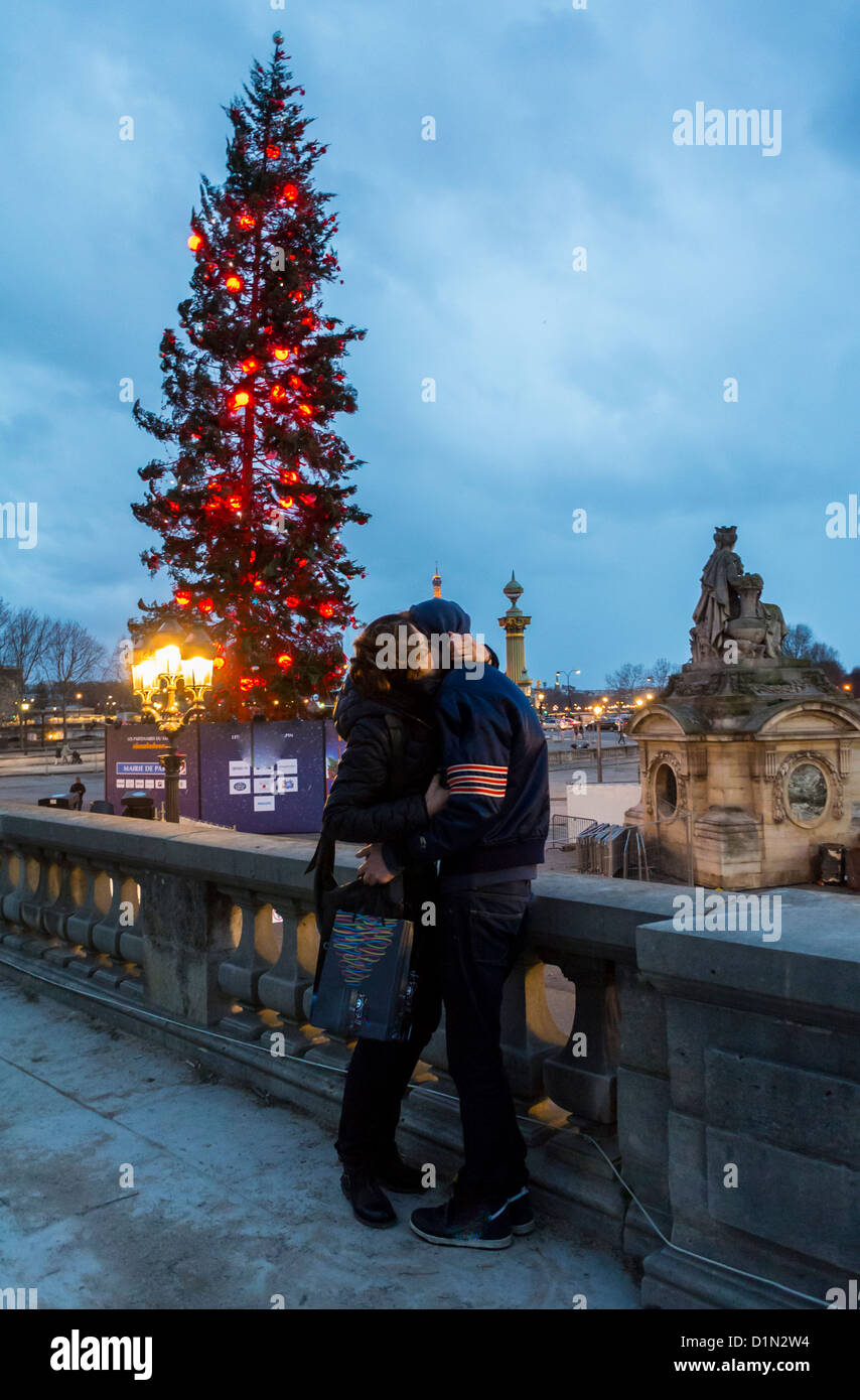 Paris France Street Scenes Teen Couple Kissing With Christmas