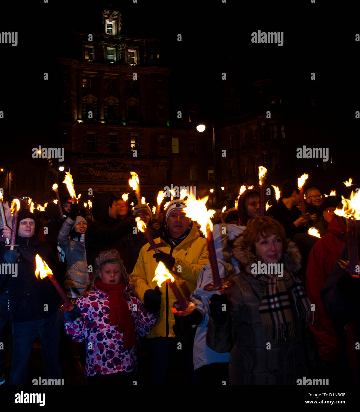 Edinburgh, UK. 30 December, 2012.  Torchlight Parade in Edinburgh to signal the start of the Scottish capital's 2012 New Year celebrations concluding with fireworks display on Calton Hill Stock Photo