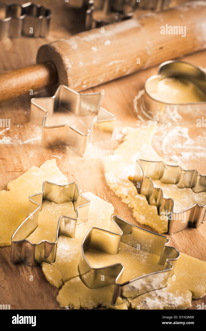 Christmas Cookie Cutters with rolling pin and dough Stock Photo Alamy