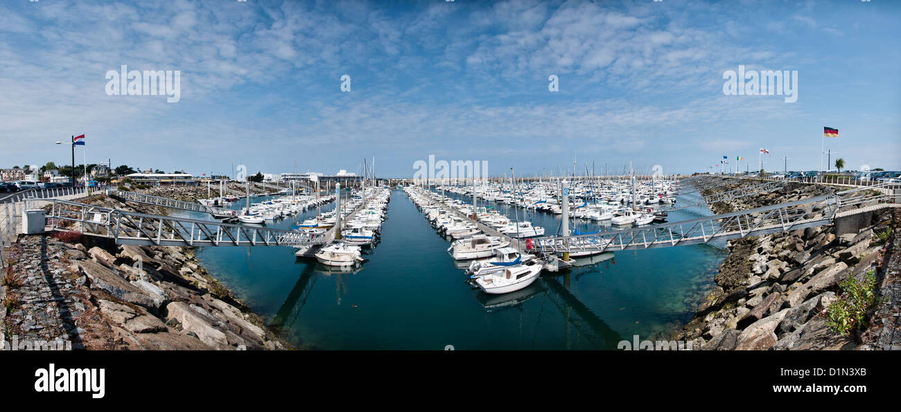 Pleasure boats in Saint-Quay Portrieux Marina in Brittany France with blue sky, Côtes d'Armor, cruising vacation, panoramic view Stock Photo