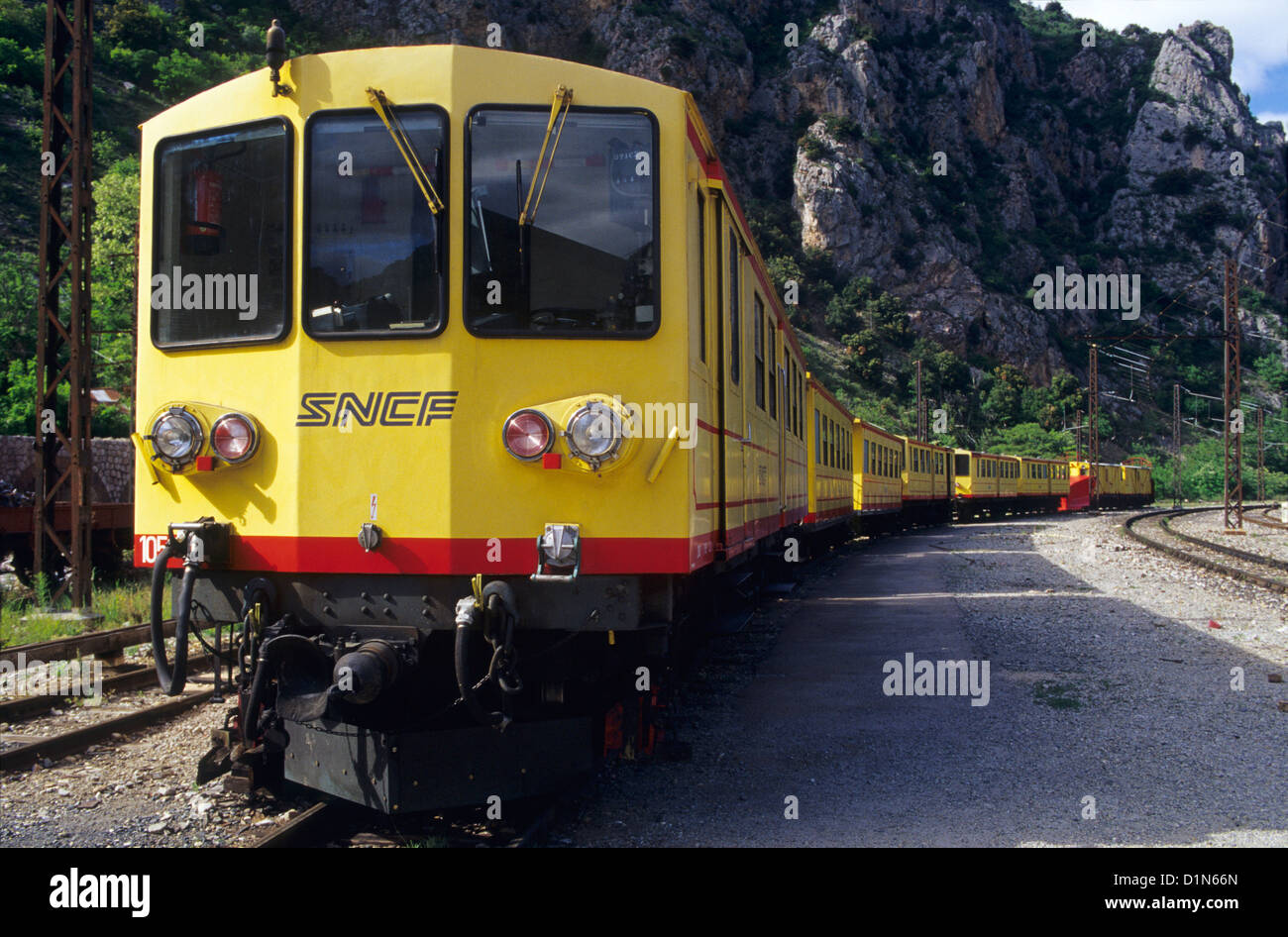 Touristic yellow train, Villefranche de Conflent, Eastern Pyrenees, Languedoc-Roussillon, France Stock Photo