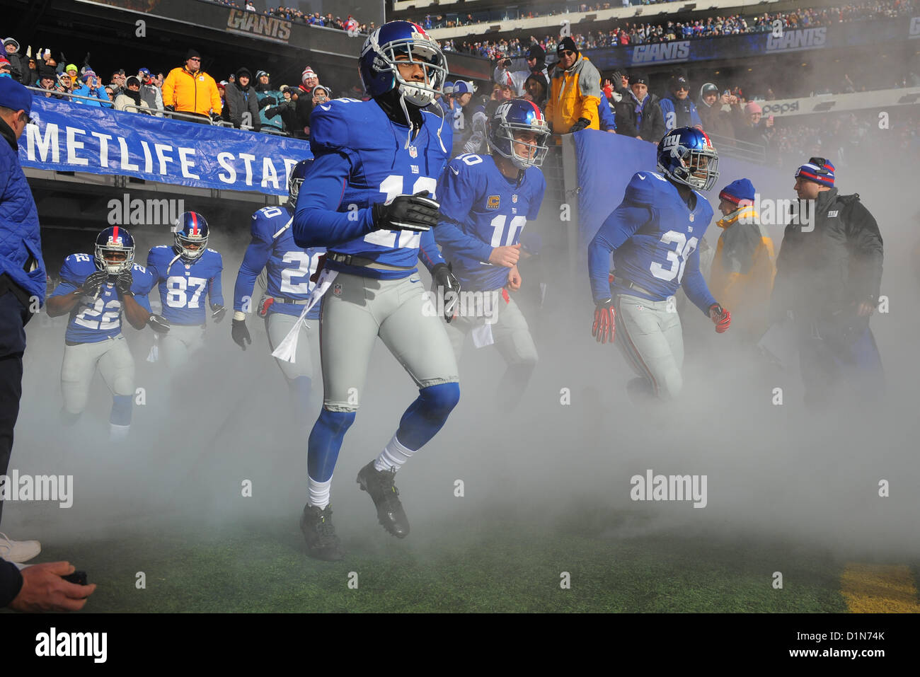 New Jersey, USA. 30 December 2012: New York Giants take the field during a week 17 NFL matchup between the Philadelphia Eagles and New York Giants at MetLife Stadium in East Rutherford, New Jersey. Stock Photo
