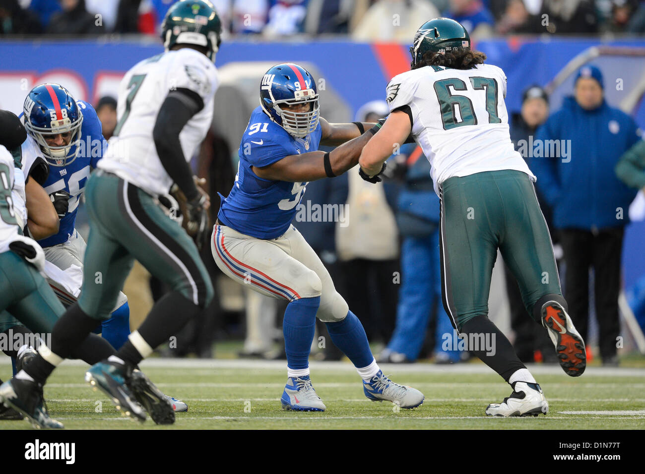 New York Giants defensive end Justin Tuck (91) pumps up the crowd during  second half NFL action in the New York Giants' 31-18 victory over the  Carolina Panthers at New Meadowlands Stadium