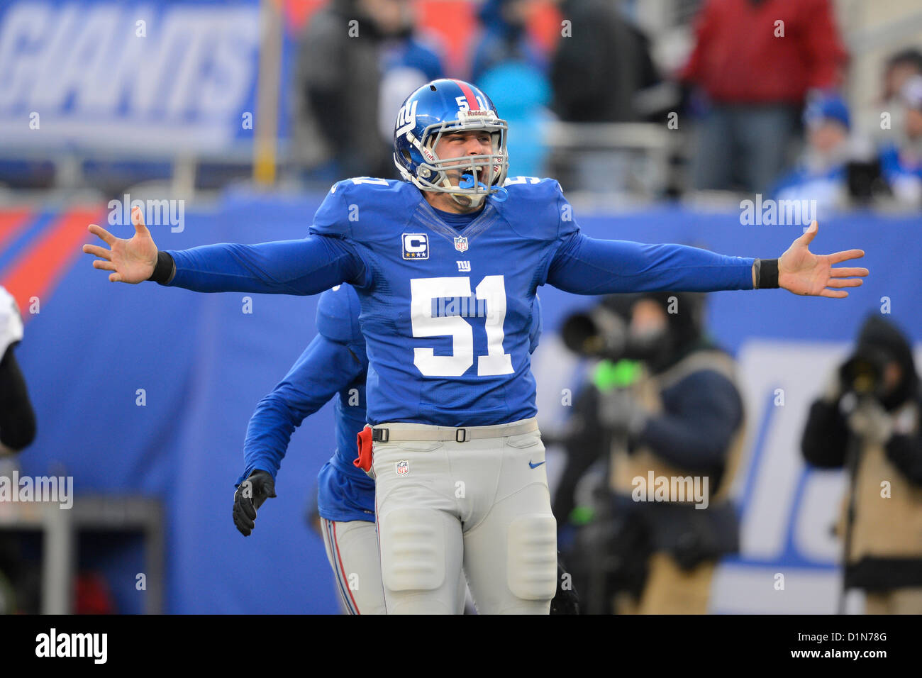 New Jersey, USA. 30 December 2012: New York Giants long snapper Zak DeOssie  (51) reacts after a tackle on Philadelphia Eagles wide receiver Damaris  Johnson (not pictured) on a punt return during