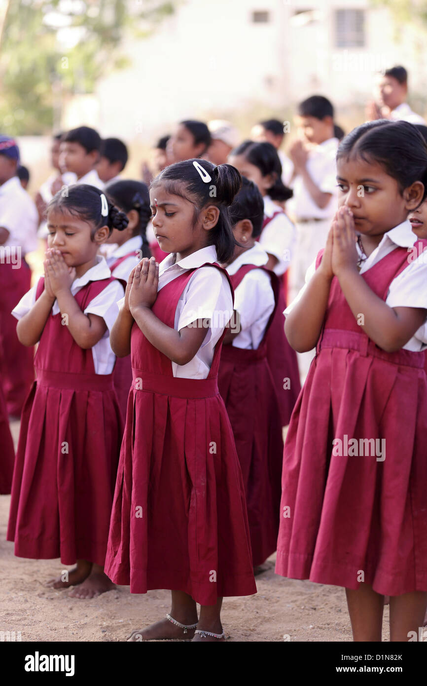 Indian school children during morning prayers Andhra Pradesh South India Stock Photo