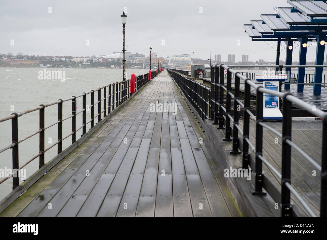 Southend on Sea, Essex. A wet and windy day on Southend Pier, the world's longest pleasure pier at 1 and 1/4 miles long. The weather kept most people away on this day.  Credit:  Allsorts Stock Photo / Alamy Live News Stock Photo