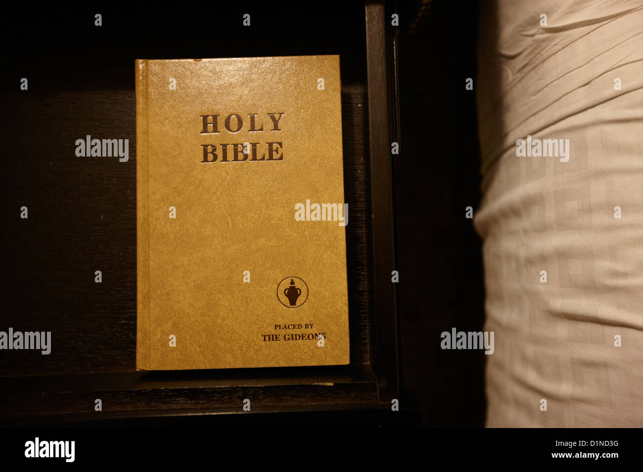 holy bible left by the gideons in a drawer at the side of the bed in a