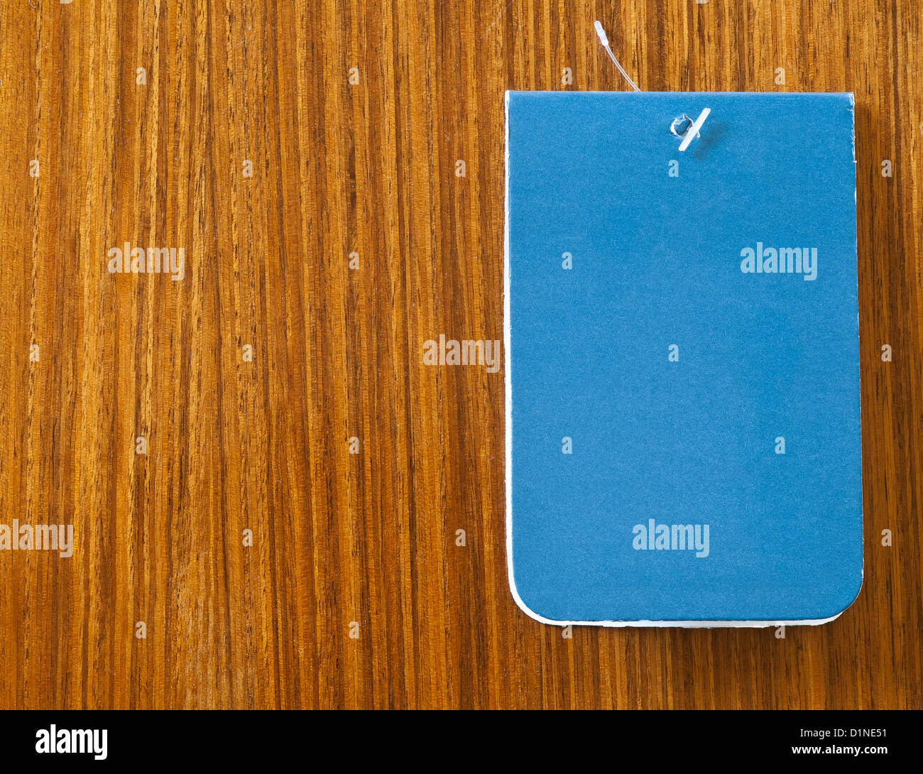 Blank blue label or price tag on wooden surface Stock Photo Alamy