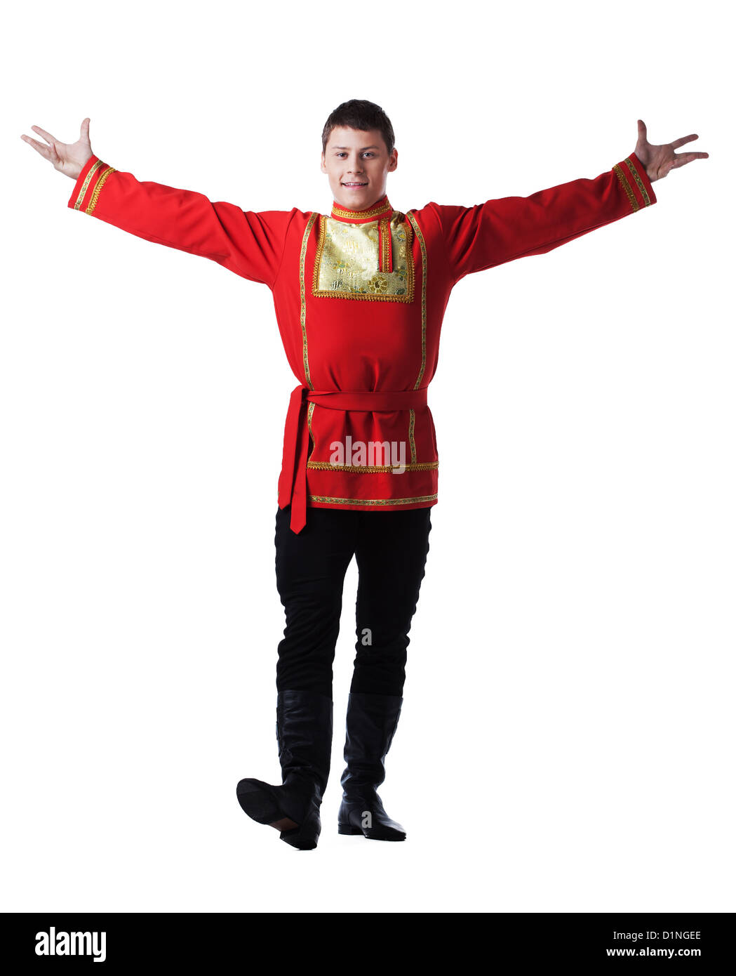 Full length portrait of dancer in traditional russian costume. Isolated