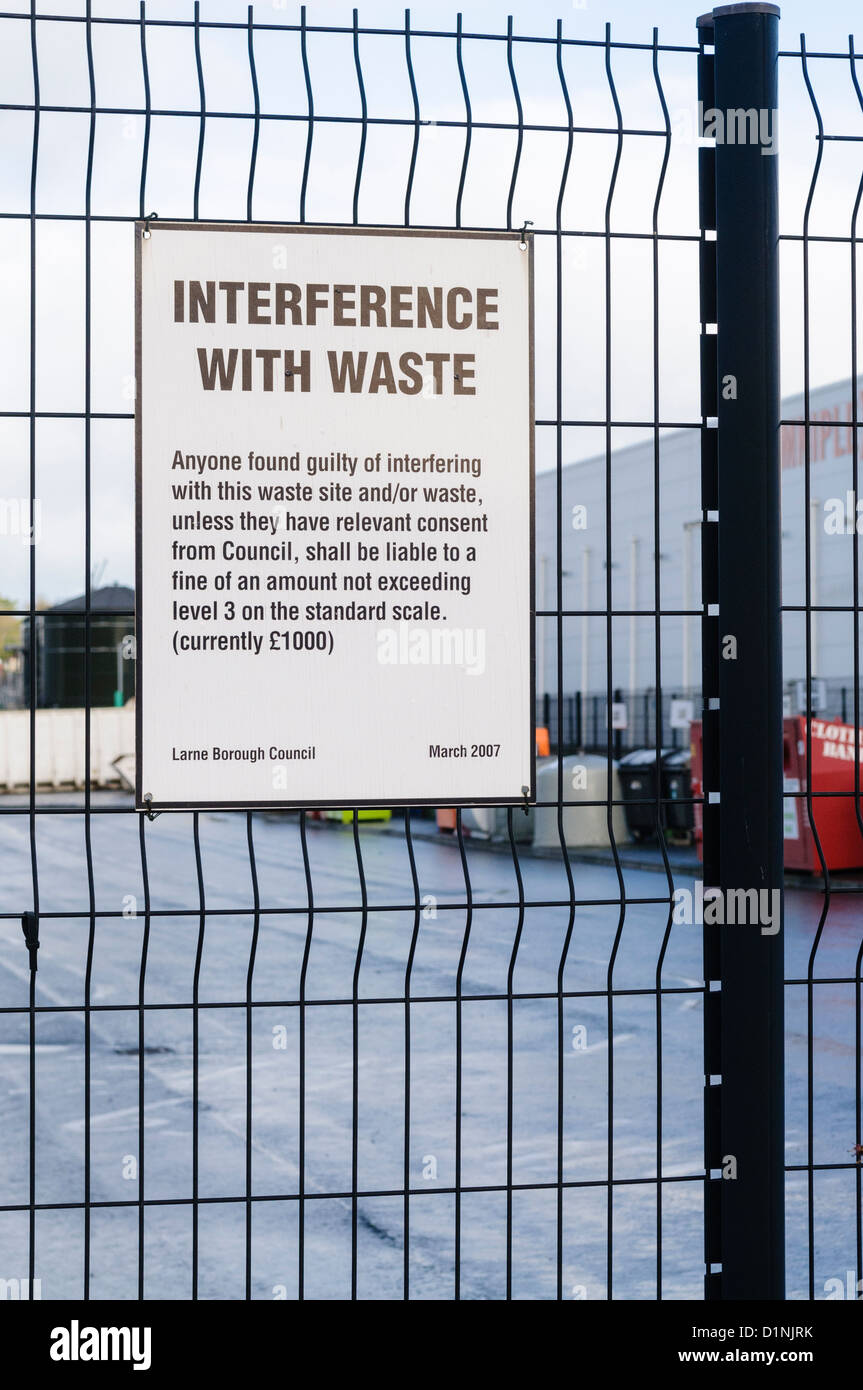 Sign at a civic amenity site warning against interference of waste Stock Photo