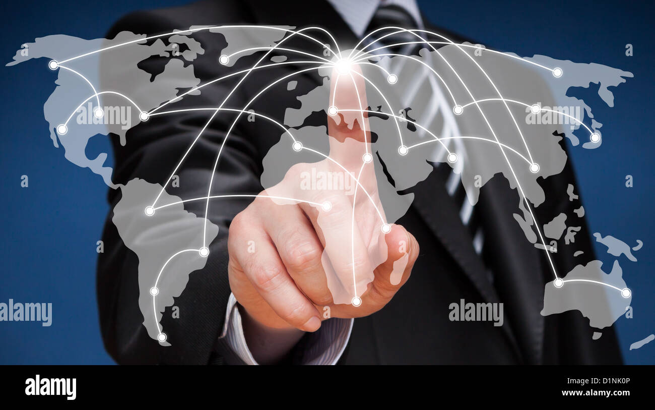 Business man touching world map screen. Social network. Stock Photo