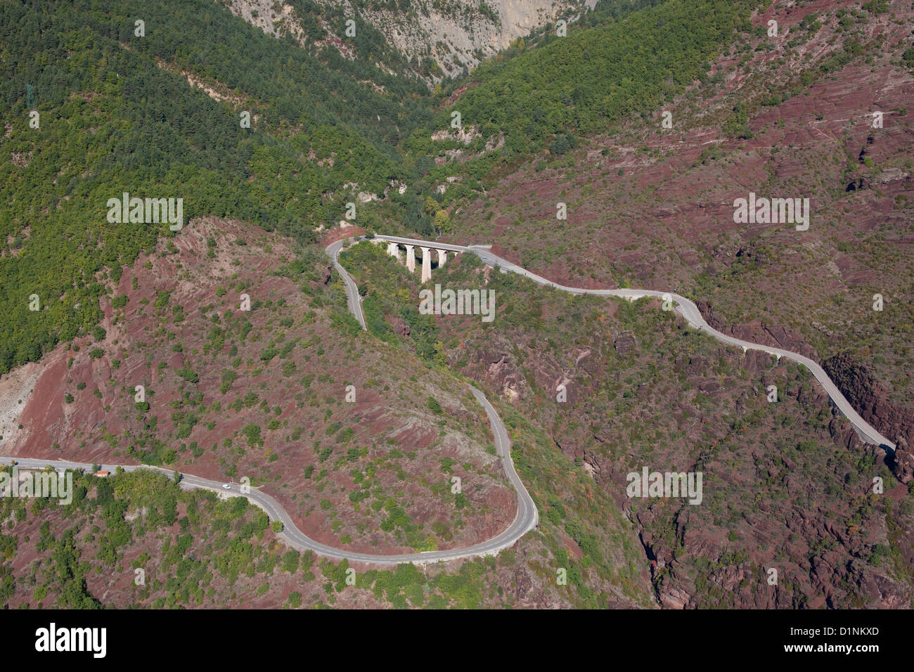 AERIAL VIEW. Road leading to the spectacular Daluis Gorge. Berthéou Bridge, Guillaumes, Var Valley, French Riviera's backcountry, France. Stock Photo