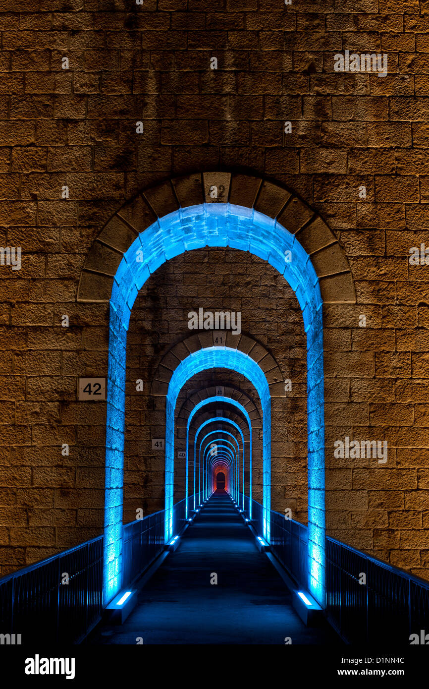 Path to Infinity. LED lights illuminates the 2nd floor of Chaumont's historic viaduct. Haute-Marne, Champagne-Ardenne, Grand Est, France. Stock Photo