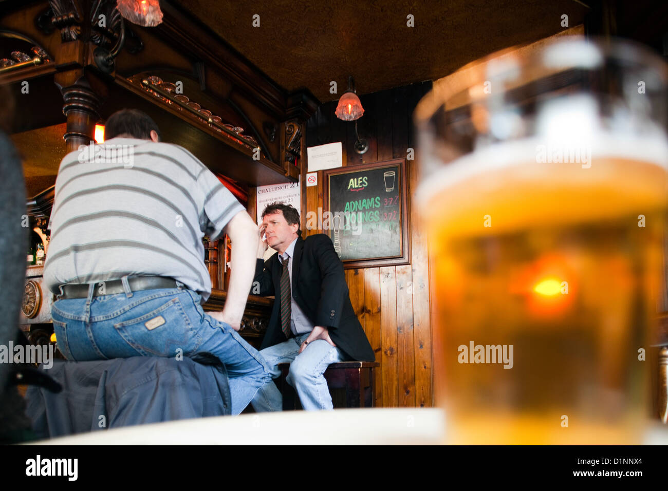 London, United Kingdom, men at a bar in a pub in London Stock Photo