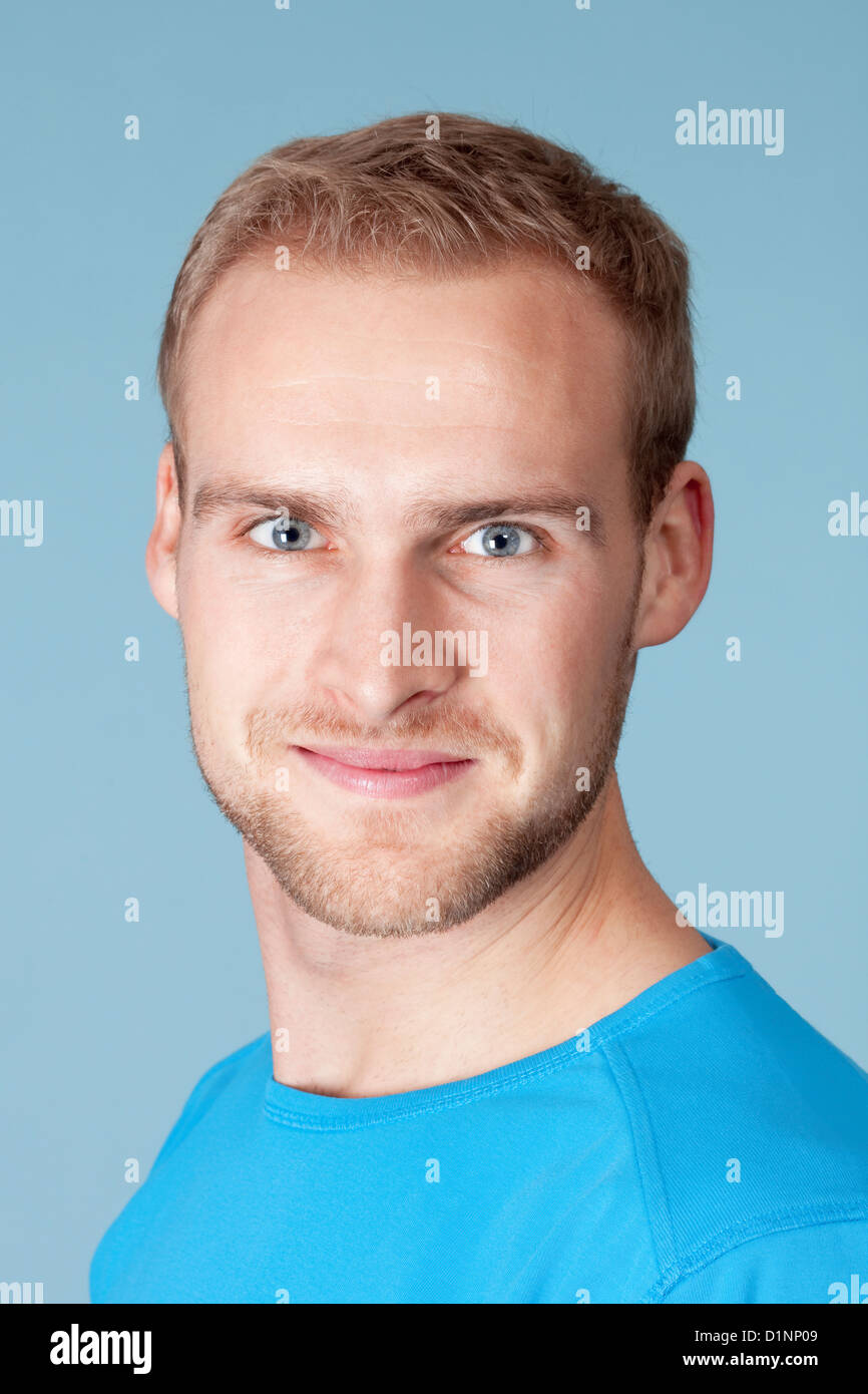 Handsome young man blond hair and blue eyes hi-res stock photography ...
