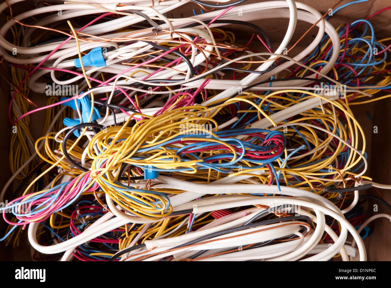 Close-up of view of numerous tangled electrical wires. Stock Photo