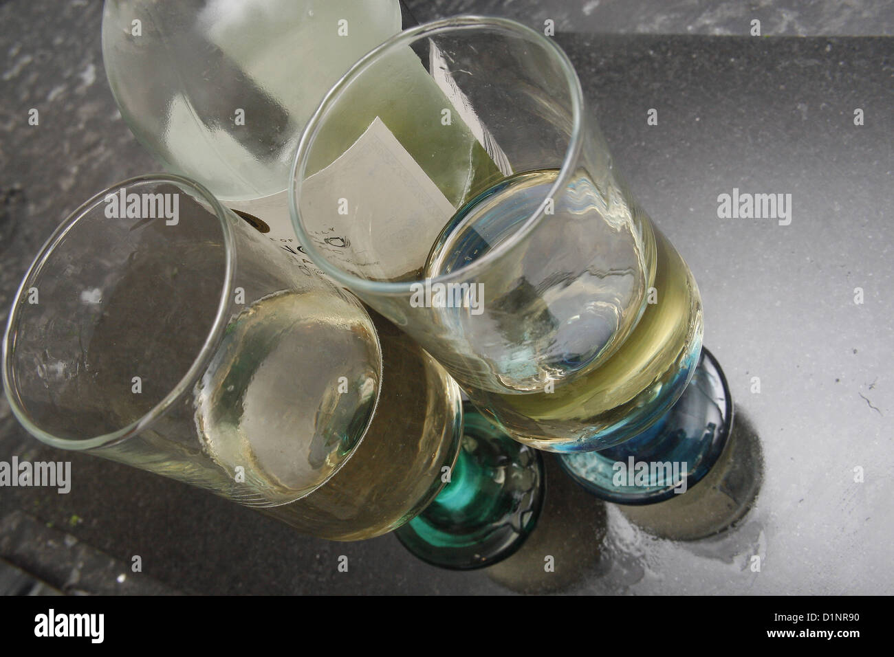 italian white wine in bottle and two glasses Stock Photo