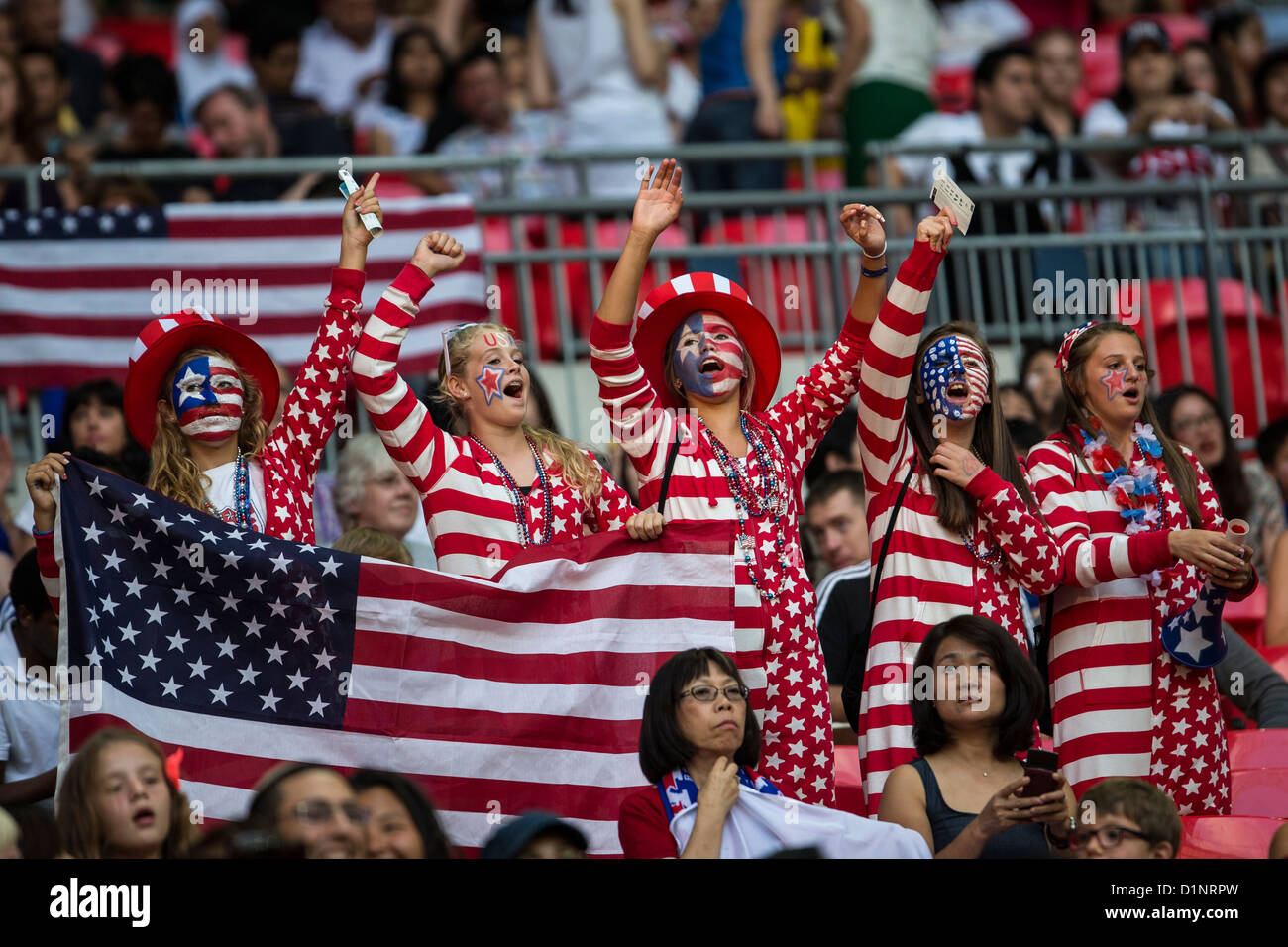 USA fans watch USA wins gold over Japan in Women's Football (soccer) at the Olympic Summer Games, London 2012 Stock Photo