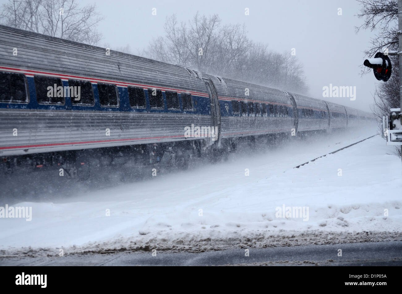 Amtrak passenger train speeds though small town in upstate NY Stock