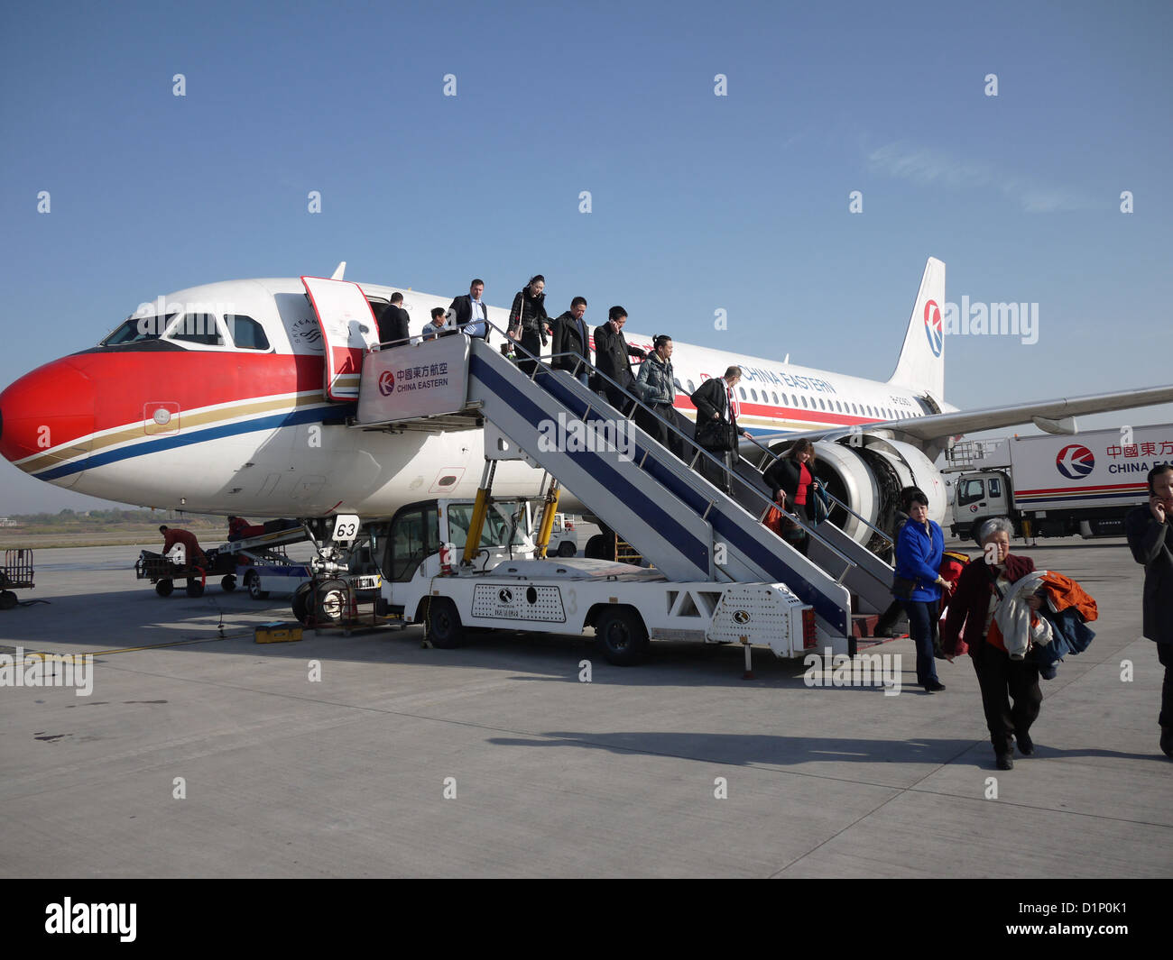 chinese plane passenger departing "getting off Stock Photo 52729237