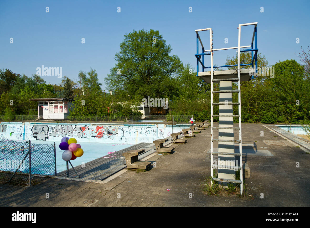 Spring Board in an old and deserted Swimming Bath in Berlin, Germany Stock Photo