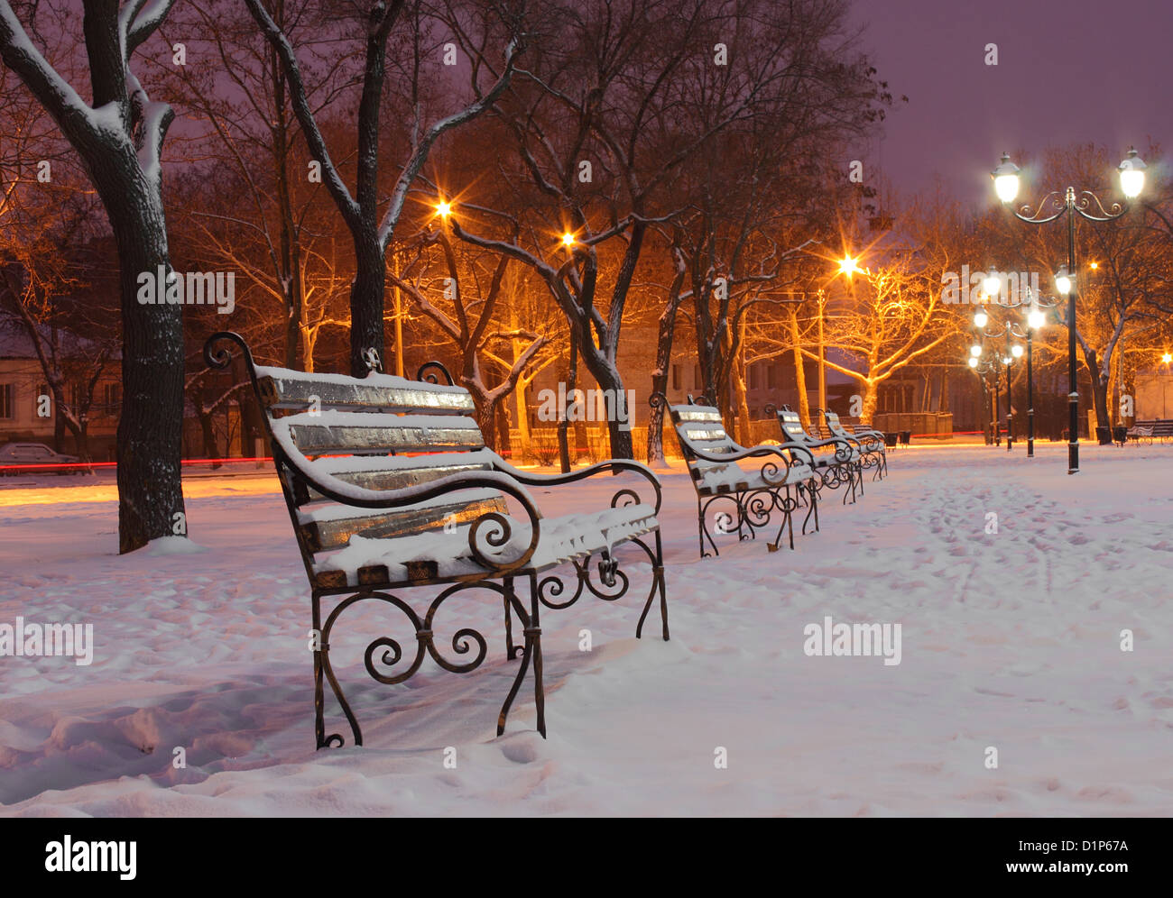 benches in park at winter night Stock Photo - Alamy