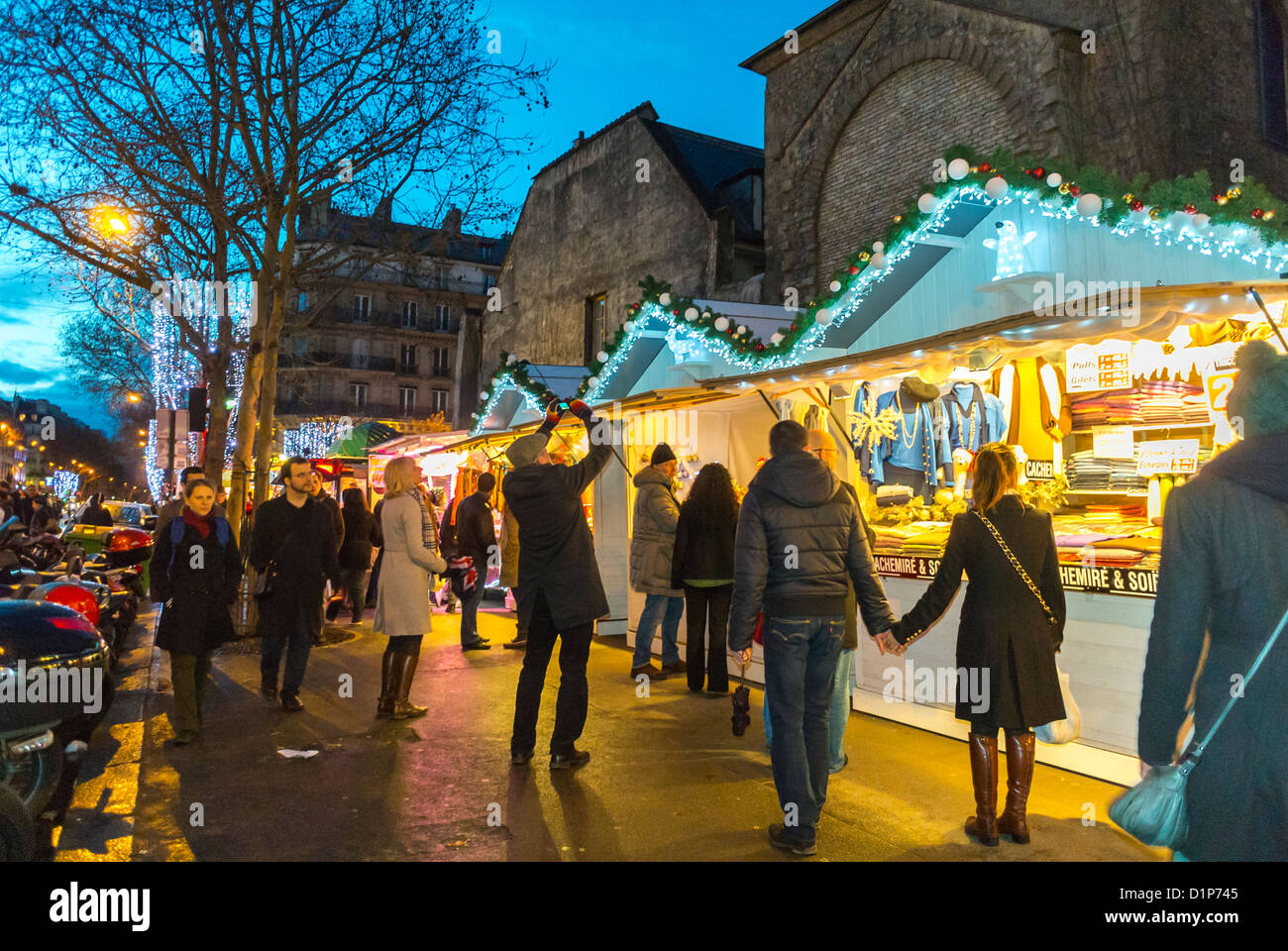 Paris, France, Street Scenes, Crowd of People Shopping at French Christmas Market in Latin Quarter, Saint Germain-des-Prés, Street Vendors Night Stock Photo