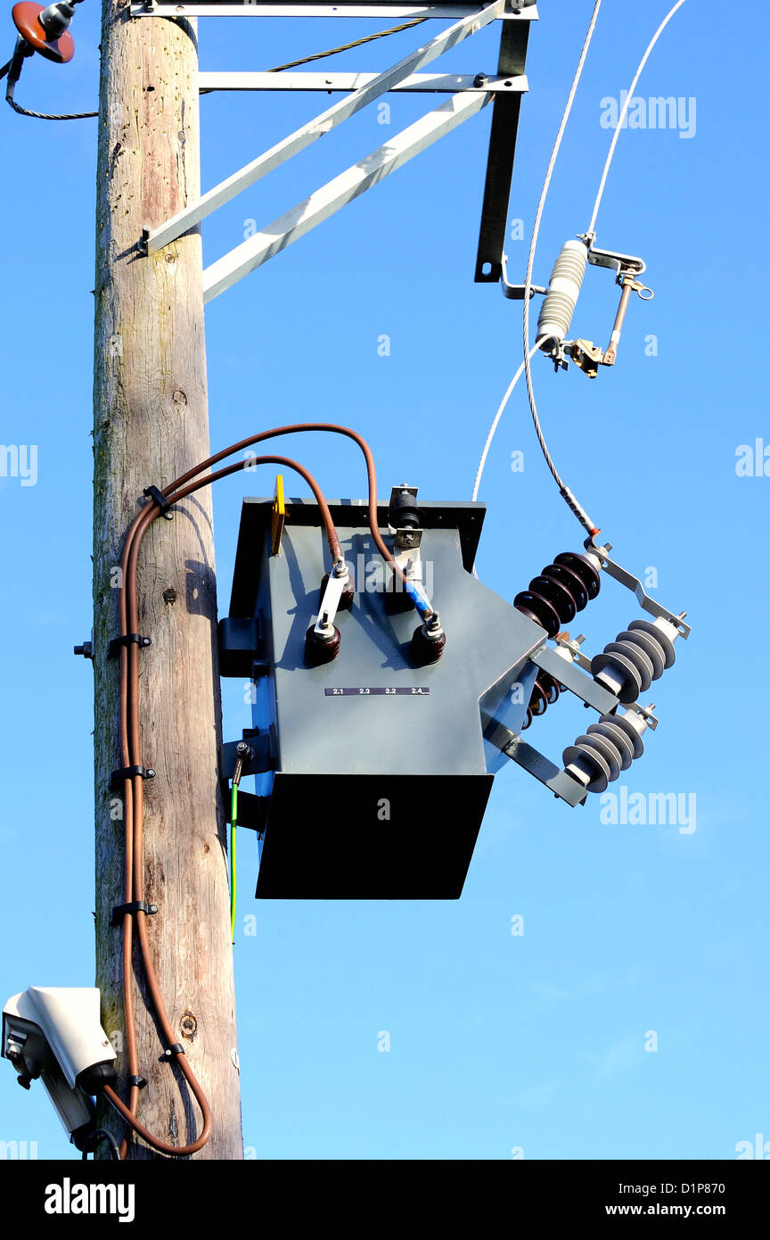 11 KV pole mounted two phase transformer with ceramic insulators and uninsulated conductors. Two core secondary output. Stock Photo