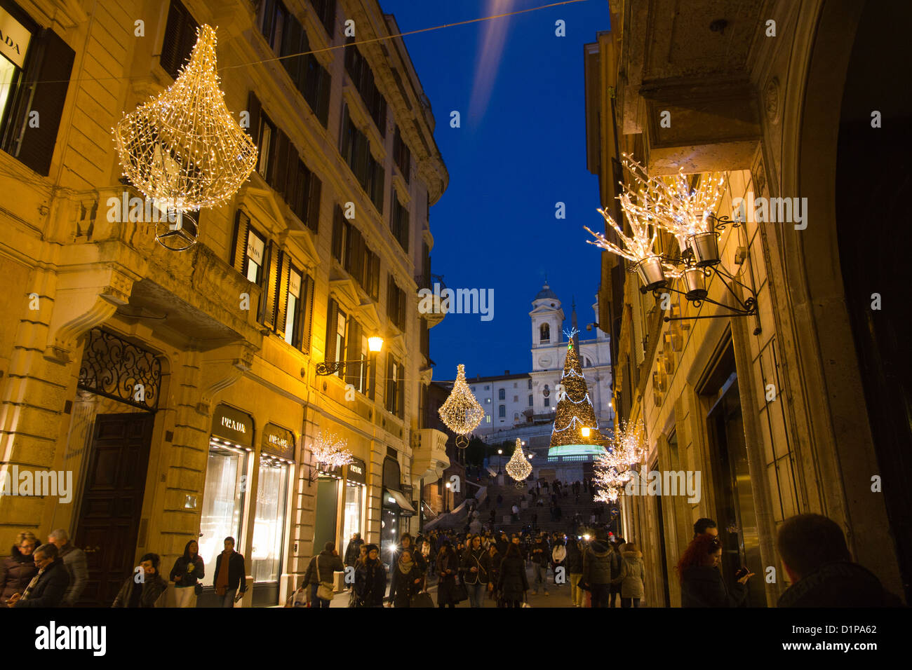Via Condotti Rome Italy Christmas decorations lights crowd of people in