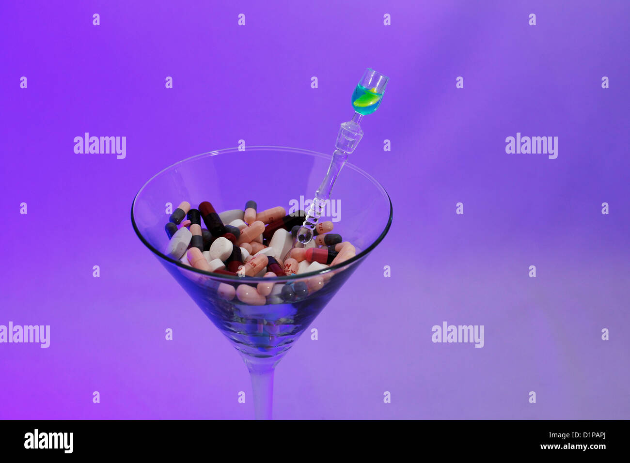 Prescription pills, tablets, capsules and martini glass. Lavender