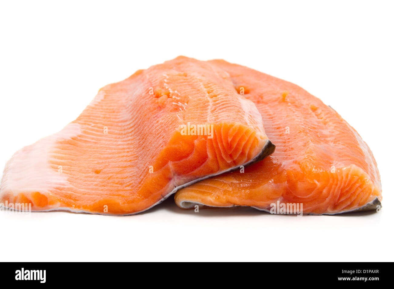 detail of salmon trout fillets over white background Stock Photo