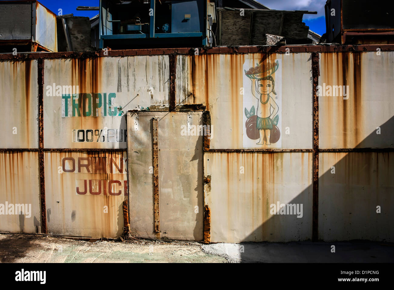 Old rusting disused Tropicana cargo container turned into a workshop at Cortez FL Stock Photo