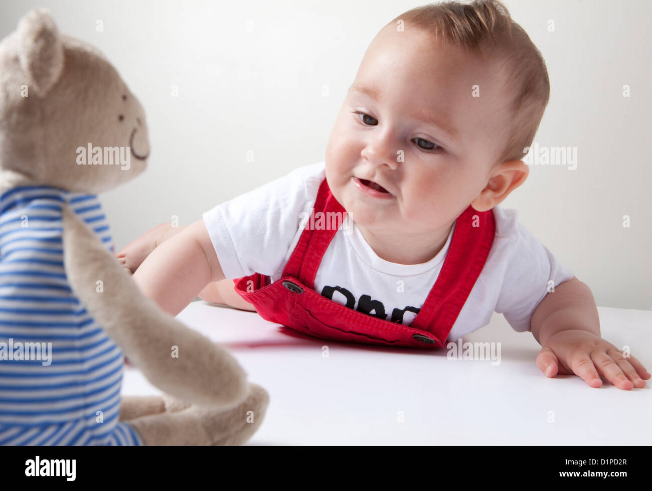 baby girl with teddy bear Stock Photo - Alamy