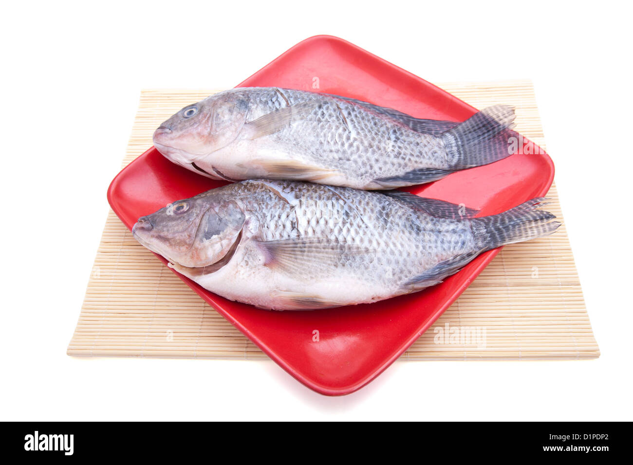 Two crucian carp on plate Stock Photo