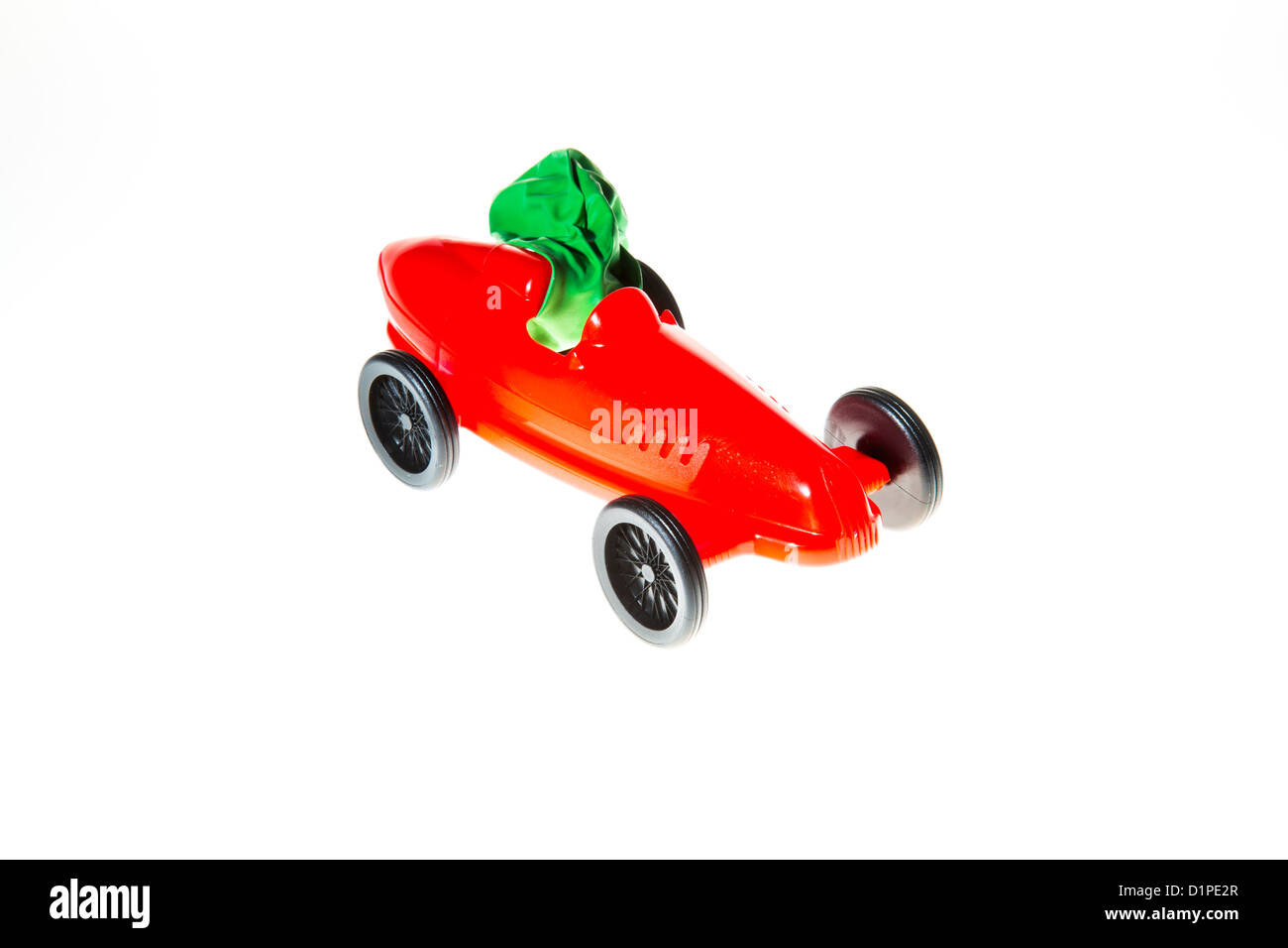 Toy car, powered by the air of a blown up balloon. The effluent air ...