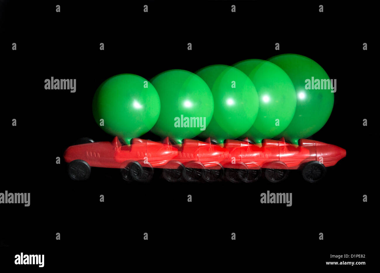 Toy car, powered by the air of a blown up balloon. The effluent air ...