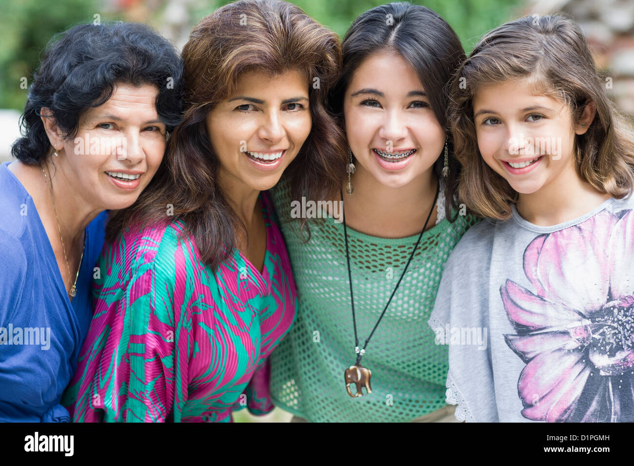 Smiling Hispanic family Stock Photo