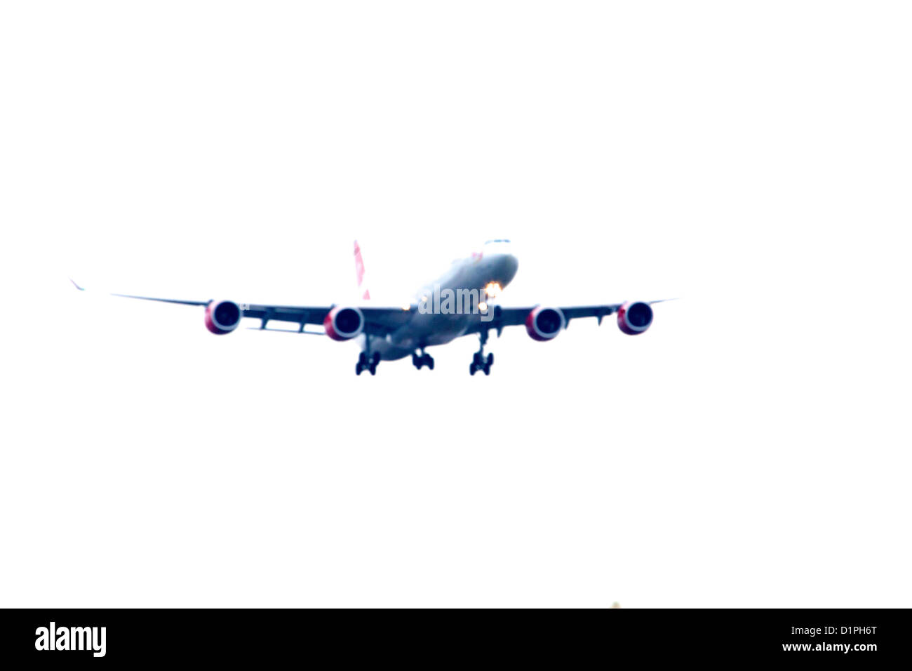 Virgin Airline airplane coming in to land at London Heathrow Airport Stock Photo