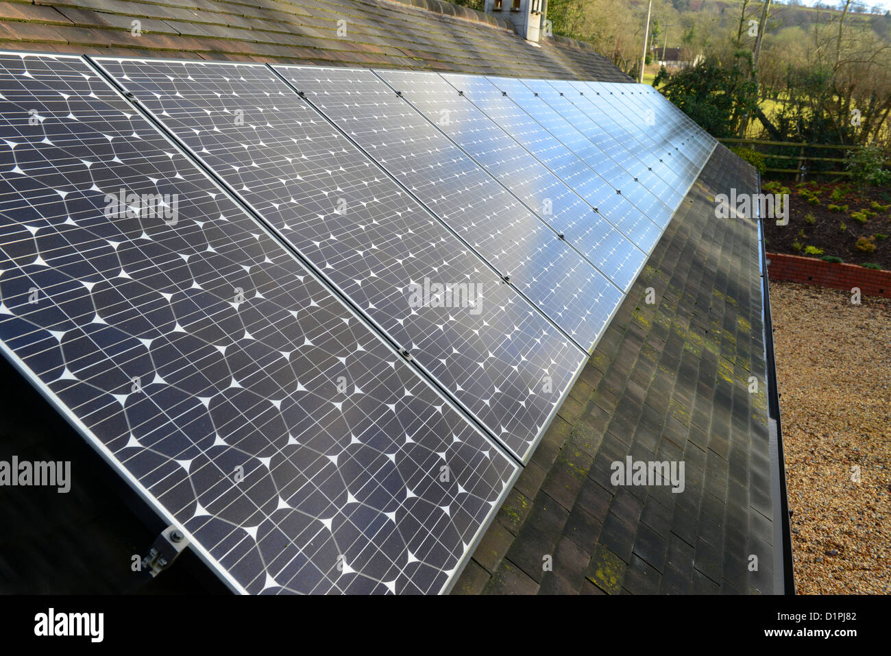 Solar panels on tiled roof Britain Uk Stock Photo